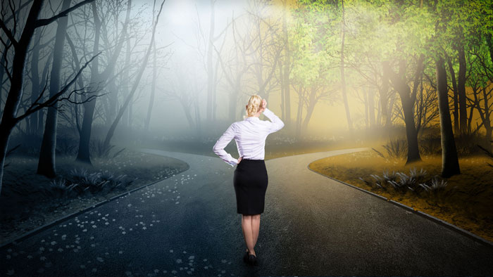 woman walking on a straight clear path